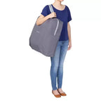 Culla portatile a dondolo 2 in 1 Baby Trend Quick-Fold - Shadow Stone Gray: Design moderno, telaio pieghevole in metallo