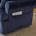 Poltrona accent girevole a barilotto Karl Home in velluto a coste beige per soggiorno