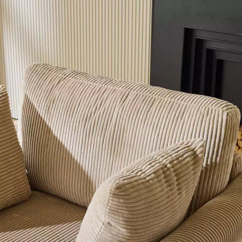 Poltrona accent girevole a barilotto Karl Home in velluto a coste beige per soggiorno