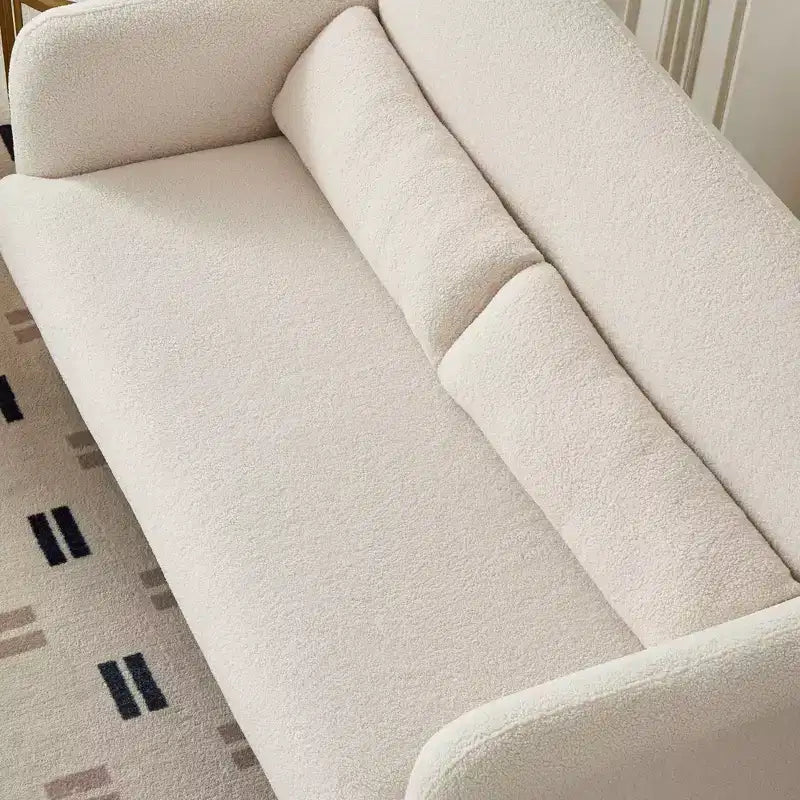Divanetto moderno MAYEERTY in tessuto agnello con struttura in legno massello e cuscini decorativi inclusi