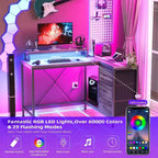 Scrivania da gioco Acekool a L con luci a LED, prese di corrente, cassetti e ripiani, scrivania ad angolo per ufficio domestico, nera