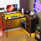 Scrivania da gioco Acekool a L con luci a LED, prese di corrente, cassetti e ripiani, scrivania ad angolo per ufficio domestico, nera