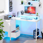 Scrivania da gioco Acekool a L con luci a LED, prese di corrente, cassetti e ripiani, scrivania ad angolo per ufficio domestico, nera