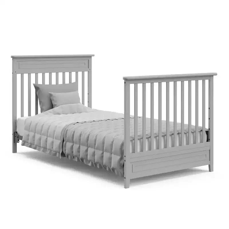 Culla trasformabile 4-in-1 Storkcraft Petal con materasso