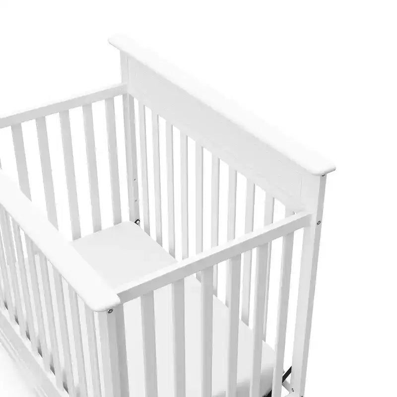 Culla trasformabile 4-in-1 Storkcraft Petal con materasso
