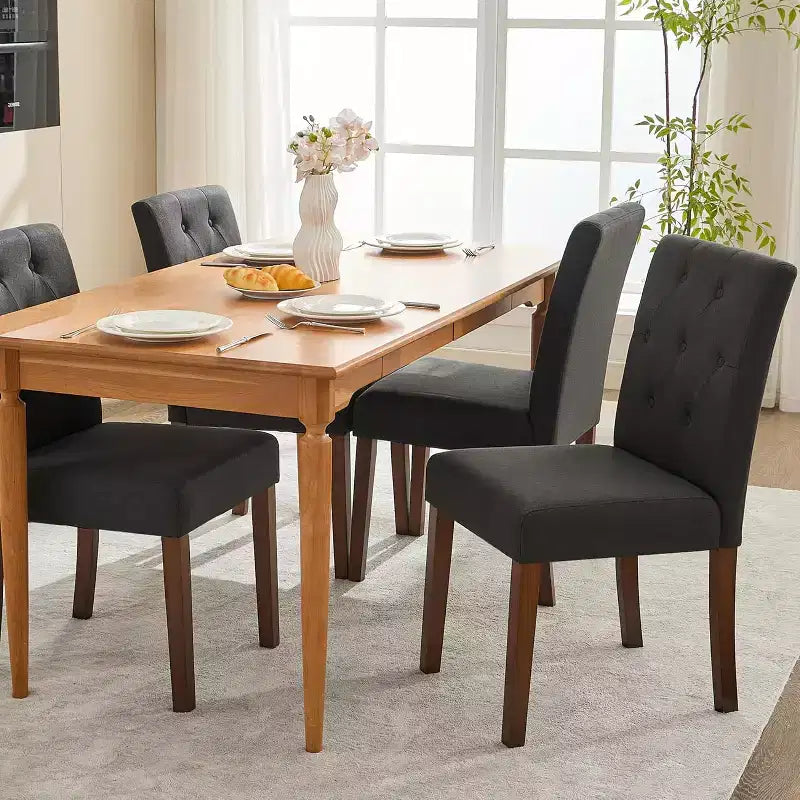 Set di 4 sedie da pranzo, sedie Parsons capitonné con gambe in legno e sedile imbottito, sedie laterali moderne in tessuto per sala da pranzo e cucina, nero