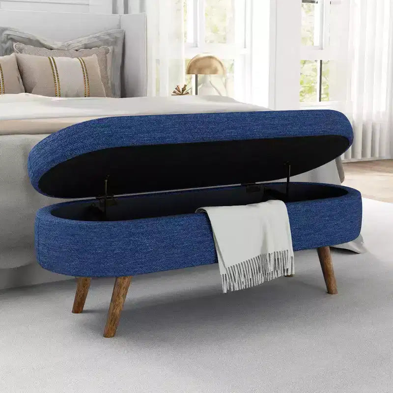 Banc de rangement ottoman Zeus et Ruta en tissu ovale avec pieds en bois d'hévéa