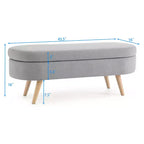 Banc de rangement ottoman Zeus et Ruta en tissu ovale avec pieds en bois d'hévéa