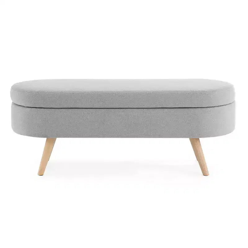 Banc de rangement ottoman Zeus et Ruta en tissu ovale avec pieds en bois d'hévéa