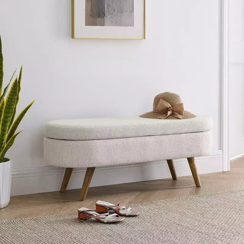 Banc de rangement ottoman Zeus et Ruta en tissu ovale avec pieds en bois d'hévéa