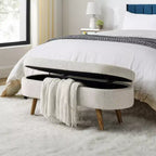 Banc de rangement ottoman Zeus et Ruta en tissu ovale avec pieds en bois d'hévéa