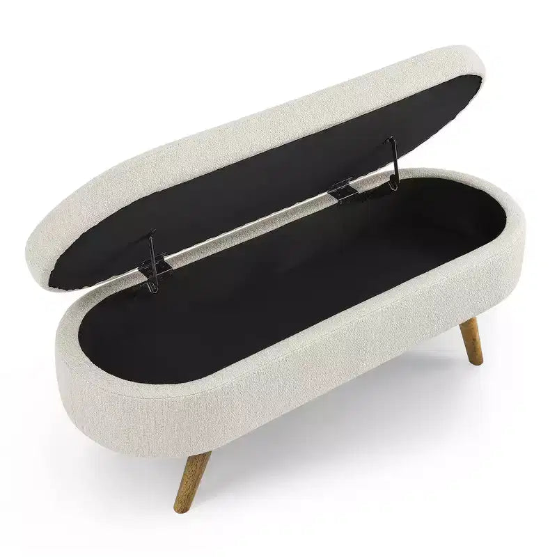 Banc de rangement ottoman Zeus et Ruta en tissu ovale avec pieds en bois d'hévéa