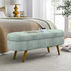 Banc de rangement ottoman Zeus et Ruta en tissu ovale avec pieds en bois d'hévéa