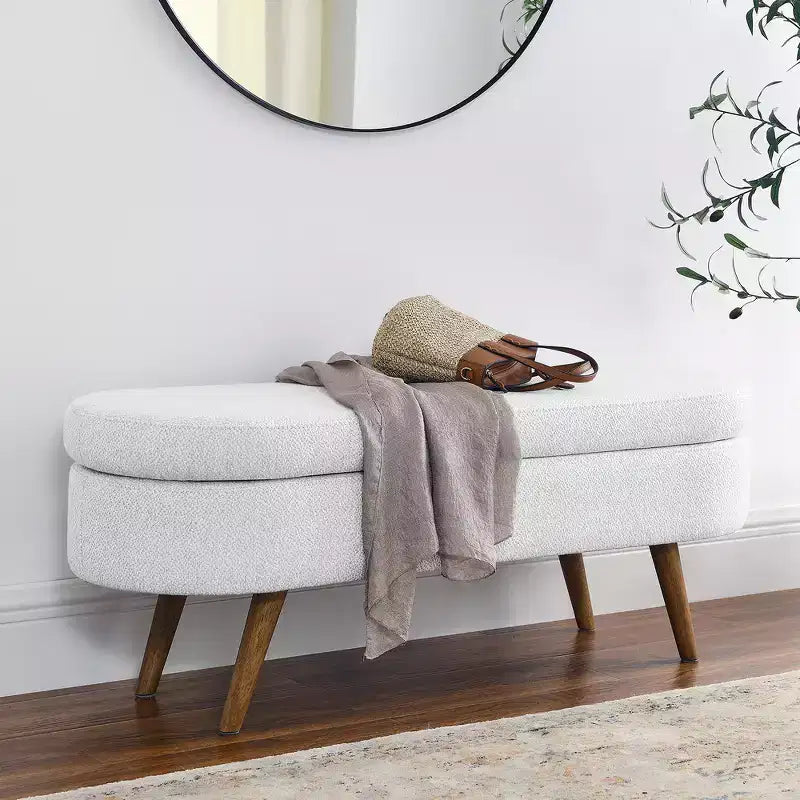 Banc de rangement ottoman Zeus et Ruta en tissu ovale avec pieds en bois d'hévéa