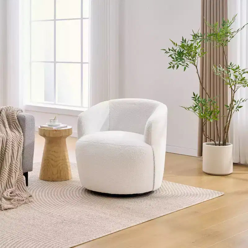 Poltrona girevole da salotto GDFStudio Almeda rivestita in tessuto Teddy con schienale ergonomico