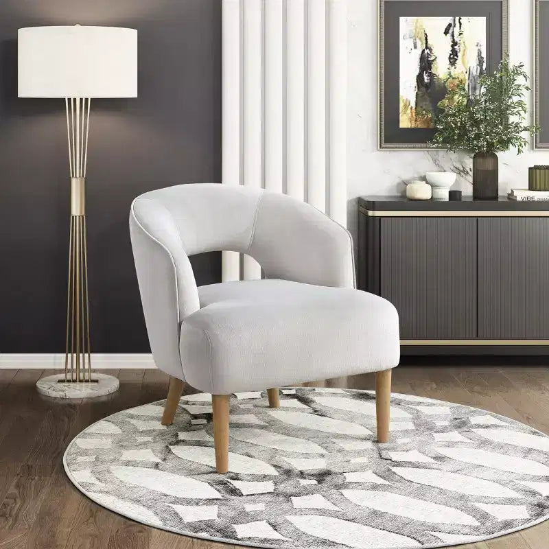 Poltrona a botte moderna imbottita in velluto GDFStudio Bennett