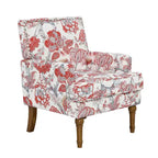 Poltrona di design Zeus & Ruta con rivestimento floreale, borchie e gambe in legno massello