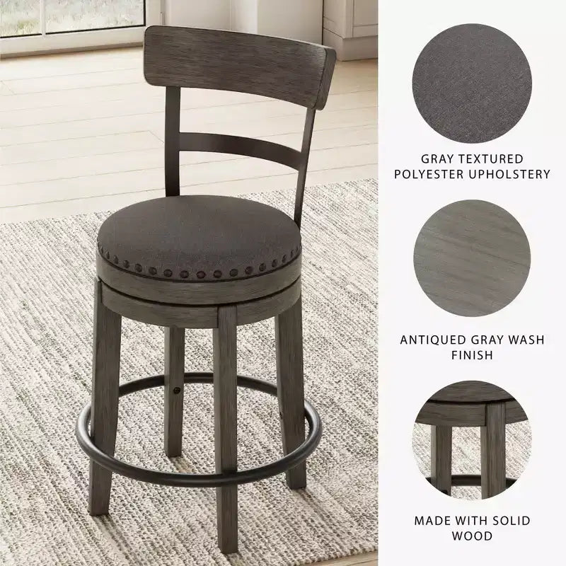 Sgabello da bar altezza bancone Caitbrook grigio - Signature Design by Ashley: Rivestimento in poliestere, borchie decorative, sedile girevole