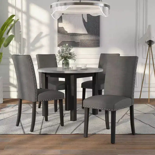 Ensemble de salle à manger rond contemporain Kellum 5 pièces : Plateau en faux marbre, Chaises cloutées - miBasics