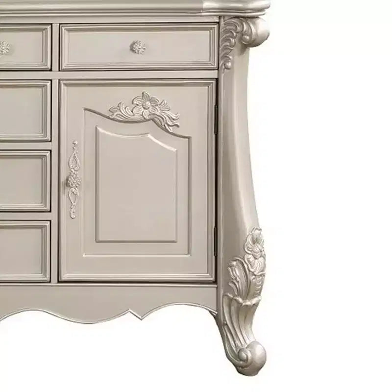 Comò Bently 71" Acme Furniture con finitura color champagne
