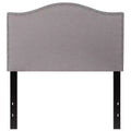 Testata imbottita ad arco Lexington di Flash Furniture con profili a borchie