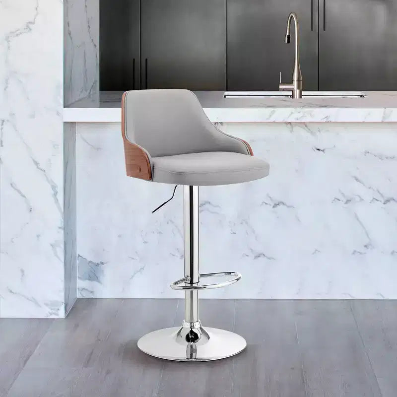 Sgabello da bar ad altezza regolabile Asher con rivestimento in similpelle cromato - Armen Living