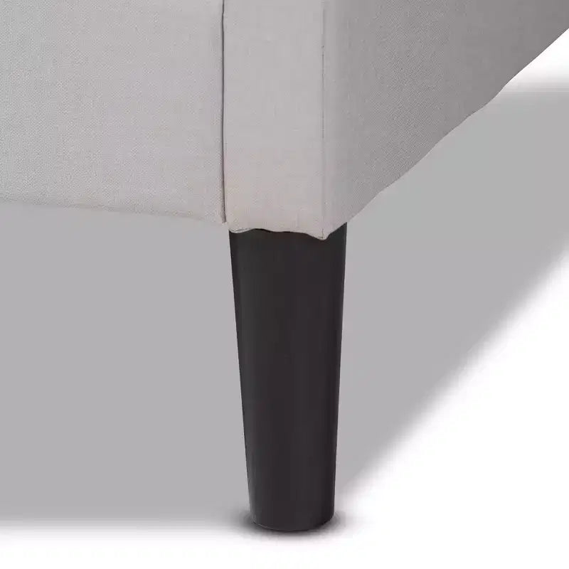 Divano letto Twin Milligan imbottito e in legno - Baxton Studio