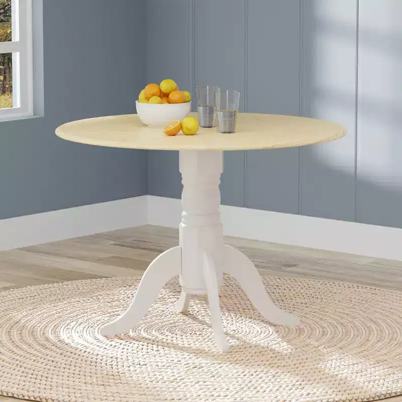 Tavolo da pranzo doppio a ribalta Glenwillow Home 42 con base a piedistallo in legno massello