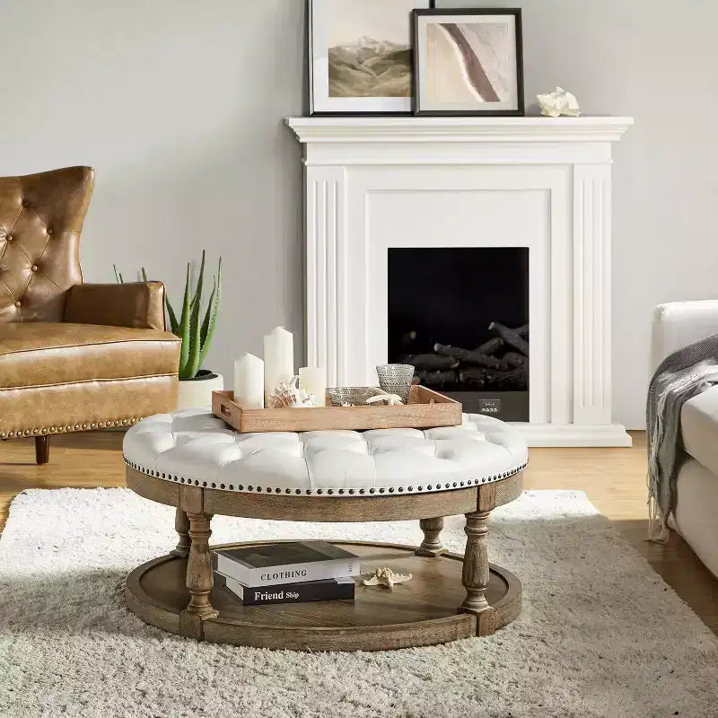 Pouf rotondo Chloe in pelle vegana con contenitore e borchie | ART OF LIVING DESIGNS