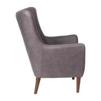 Poltrona accentata tradizionale Wingback Merrick Lane, rivestimento in ecopelle e struttura e gambe in legno