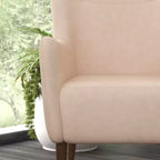 Poltrona accentata tradizionale Wingback Merrick Lane, rivestimento in ecopelle e struttura e gambe in legno