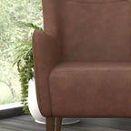 Poltrona accentata tradizionale Wingback Merrick Lane, rivestimento in ecopelle e struttura e gambe in legno