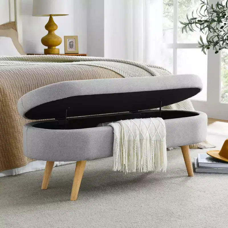 Panca Contenitore Ovale con Gambe in Legno di Hevea, Pouf Moderno Trapuntato - ModernLuxe
