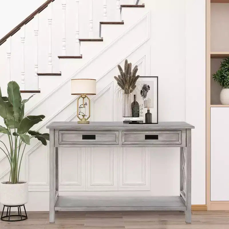 Consolle e tavolo da ingresso LuxenHome in legno grigio con 2 cassetti e 1 ripiano