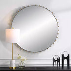 Specchio da parete rotondo Uttermost Cosmopolitan nero opaco e ottone 37 1/2
