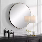Specchio da parete rotondo Uttermost Cosmopolitan nero opaco e ottone 37 1/2