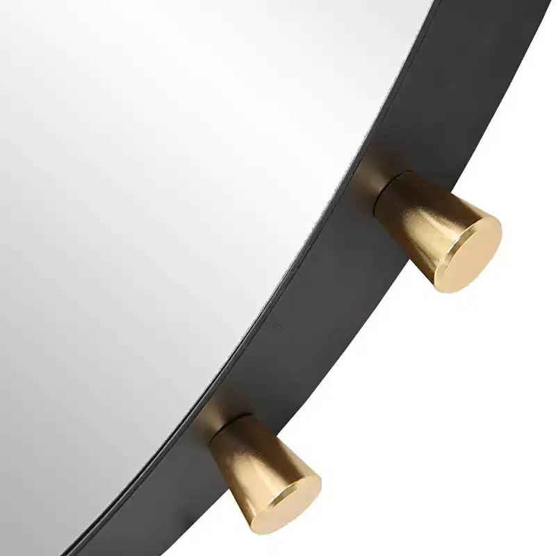 Specchio da parete rotondo Uttermost Cosmopolitan nero opaco e ottone 37 1/2