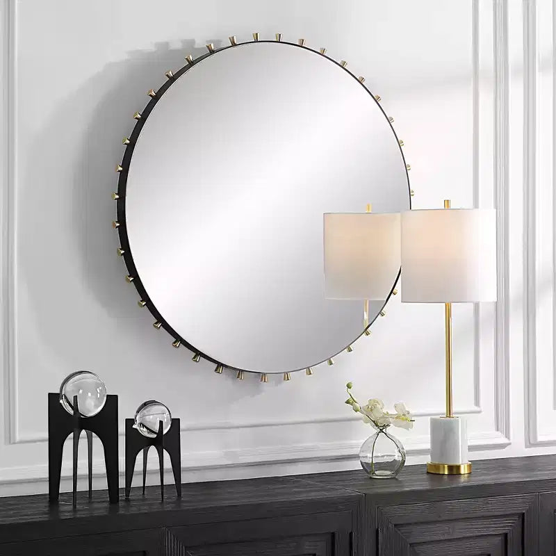 Specchio da parete rotondo Uttermost Cosmopolitan nero opaco e ottone 37 1/2