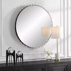 Specchio da parete rotondo Uttermost Cosmopolitan nero opaco e ottone 37 1/2