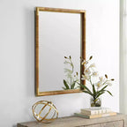 Specchio da parete per bagno Kampar di Uttermost, oro anticato e rattan, 56 x 81 cm