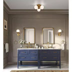 Specchio da parete per bagno Kampar di Uttermost, oro anticato e rattan, 56 x 81 cm