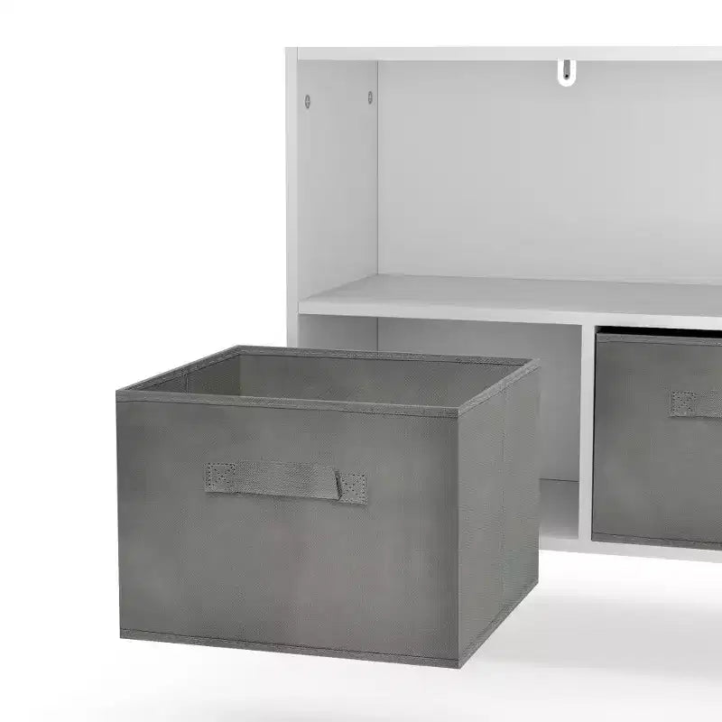 Libreria per bambini con 4 scomparti, organizer per giocattoli con cassetti in tessuto pieghevoli, espositore per libri per la cameretta dei bambini, la sala giochi e l'asilo nido