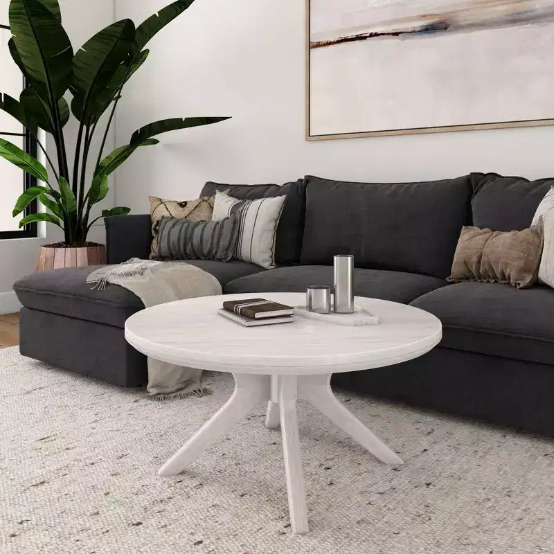 Tavolino rotondo Plank+Beam con gambe incrociate in legno massello, 91 cm, per soggiorno